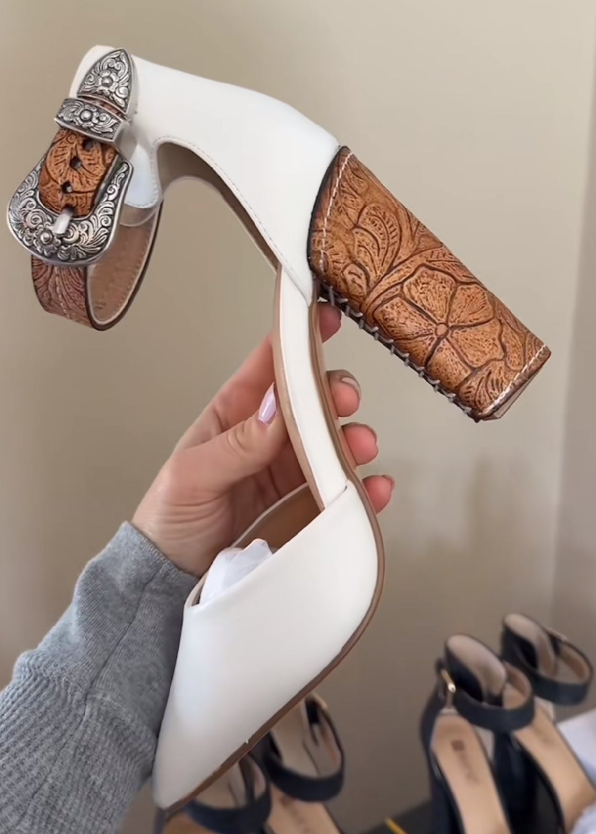 White closed toe shoes with buckle and leather